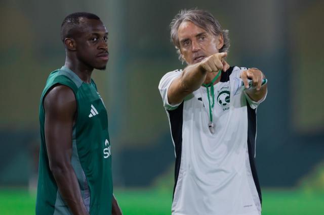 1729837722824089905.jpeg 曼奇尼与哈米德.jpeg